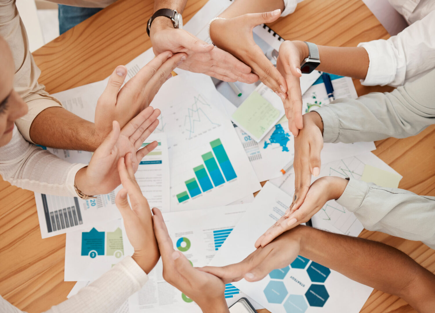 Support, circle and hands of business people in a meeting for marketing, team building and planning together at work. Teamwork, strategy and workers with a goal, trust and partnership in workshop