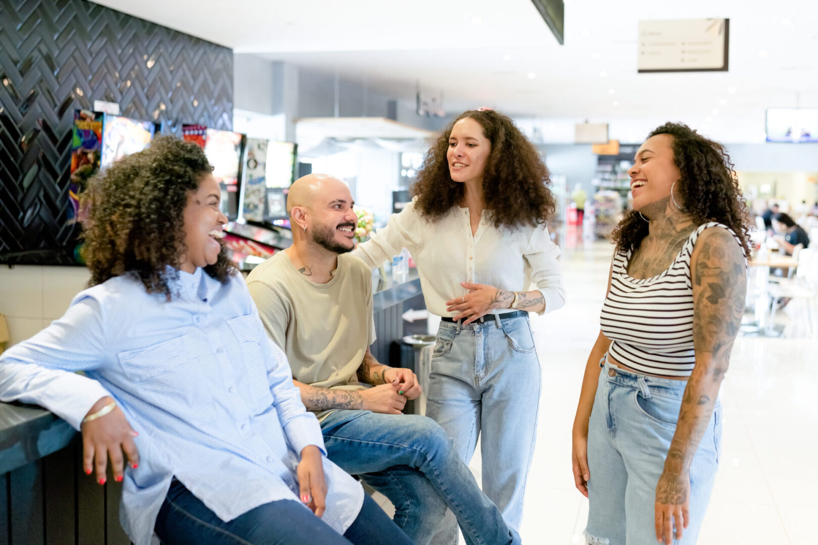 Friends meeting in city mall.